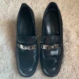 Nine West Vintage Black Slip-On Loafers with Glossy Finish and Metal Accent
